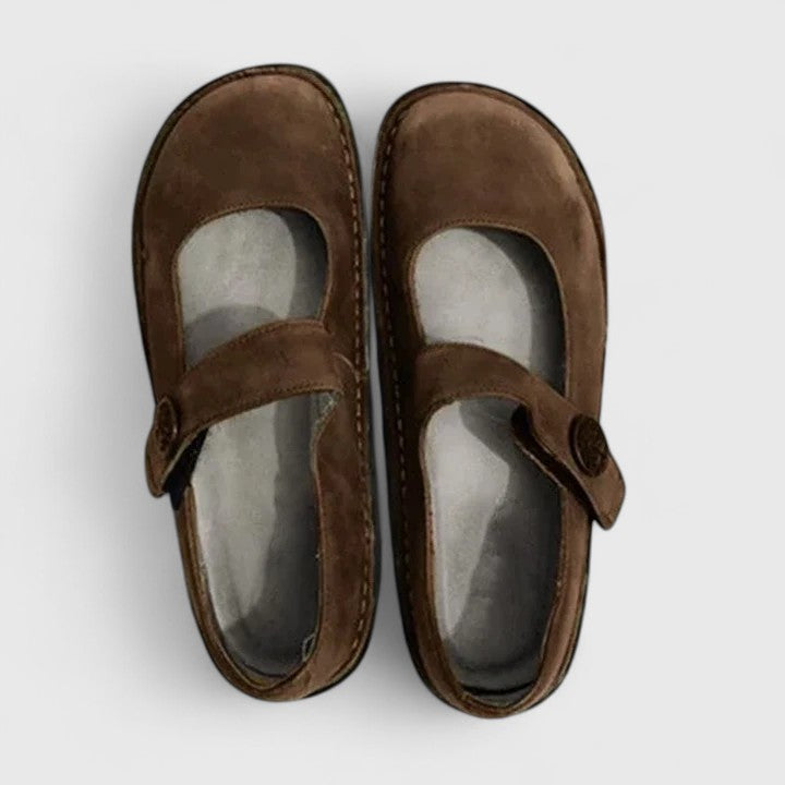 Brown suede Talia orthopedic Mary Jane shoes with wide toe boxes and adjustable straps.