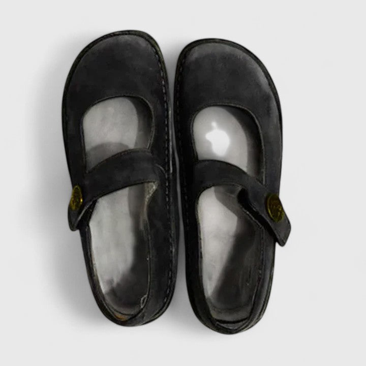 Black suede Talia orthopedic Mary Jane shoes with wide rounded toes and adjustable straps.