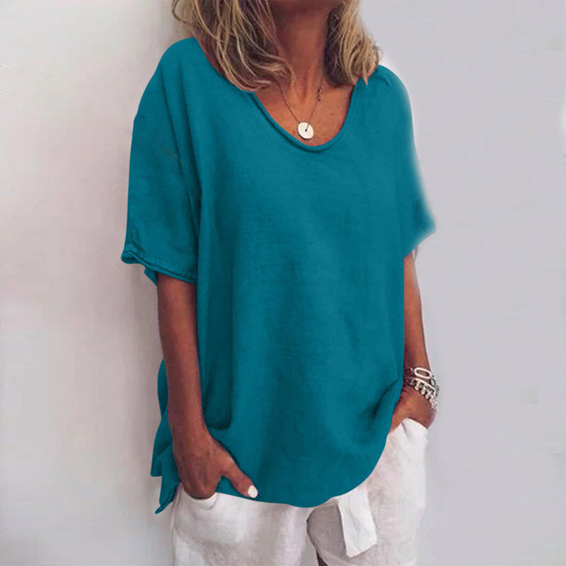 Teal blue V-neck flowy blouse with short sleeves and a relaxed, draped fit for a polished look.