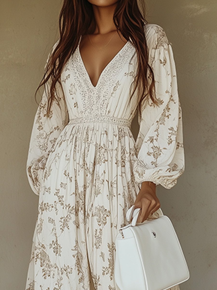 Willow floral puff sleeve maxi dress in cream with a deep V-neckline, lace trim, and tiered skirt.